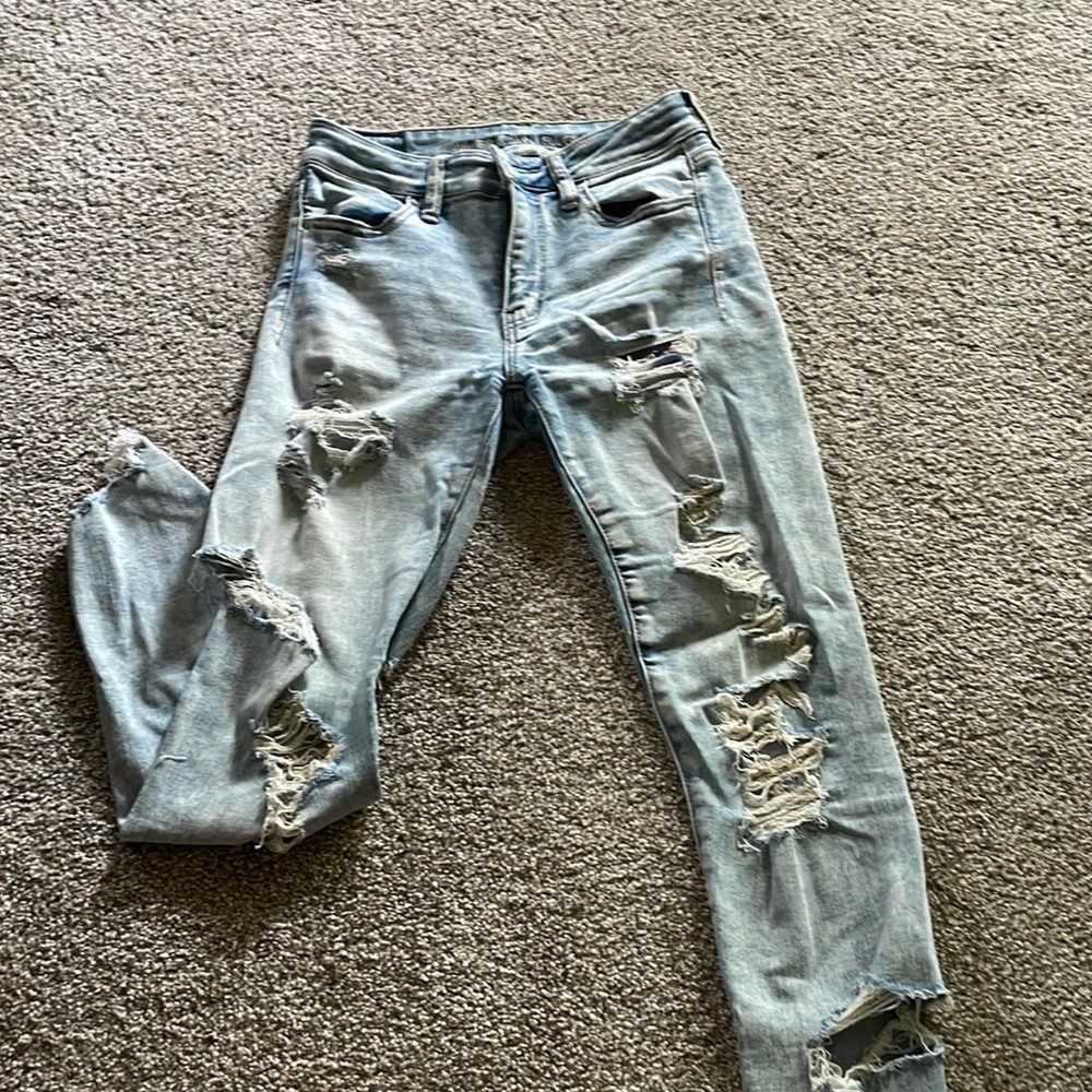 Light wash distressed American eagle jeans